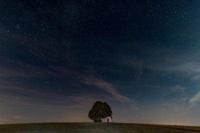 Scenic view of star field against sky at night