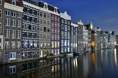 Buildings in city against sky