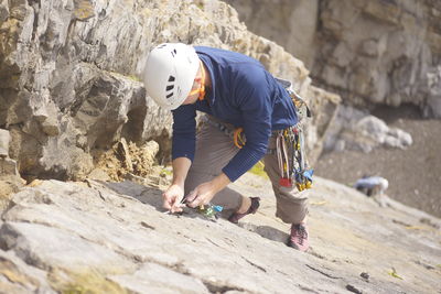 Man standing on rock