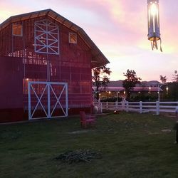 View of built structures against sunset