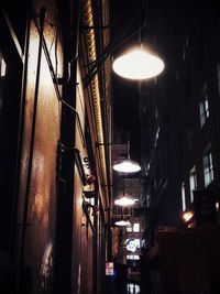 Illuminated lighting equipment hanging at night