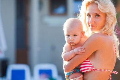 Mother and daughter outdoors