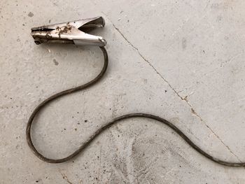 High-angle view of the cable was a source of iron in the form of a serpent on the ground...
