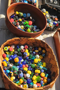 High angle view of candies in basket on table