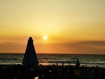 Scenic view of sea at sunset