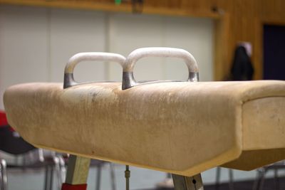 Close-up of pommel horse at gym