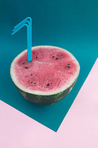 High angle view of drink on table against blue background