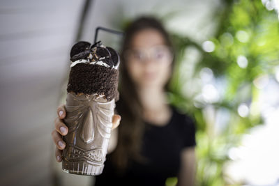 Close-up of hand holding toy