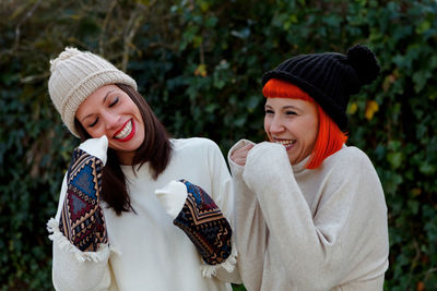 Smiling young woman wearing hat