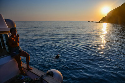 Scenic view of sea against sky during sunset