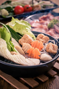 Close-up of fruits in plate on table