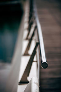 Close-up of ladder against wall