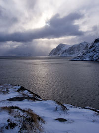 Scenic view of frozen lake against sky