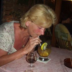 Woman drinking glasses on table