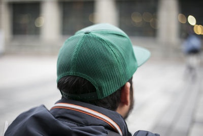 Rear view of man wearing hat
