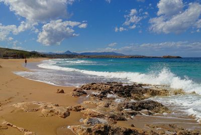 Scenic view of beach against sky