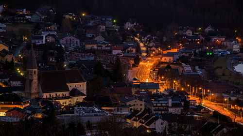 High angle view of illuminated buildings at night