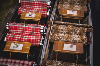 High angle view of tables and seats in restaurant