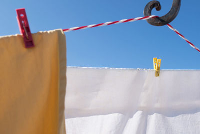 Close-up of clothes drying on clothesline