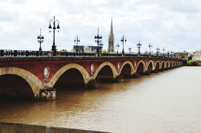 Arch bridge over river