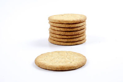 Close-up of cookies against white background