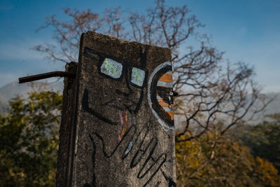 Low angle view of graffiti on old building