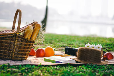 Close-up of fruits in basket on table