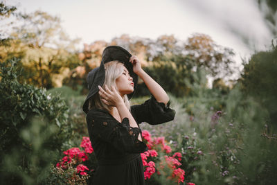 Woman standing on field