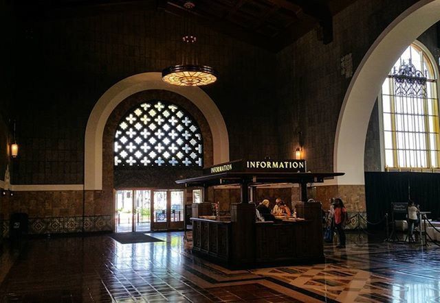 indoors, architecture, built structure, arch, window, reflection, building exterior, entrance, illuminated, building, text, interior, door, men, day, glass - material, incidental people, wall - building feature, old