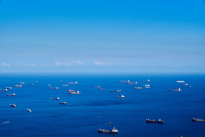 Scenic view of sea against blue sky