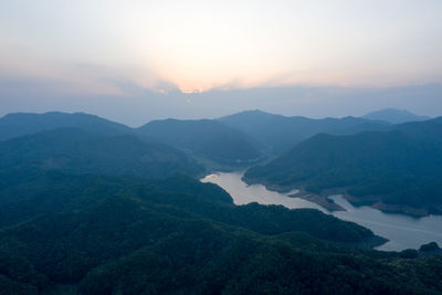 Scenic view of mountains against sky during sunset