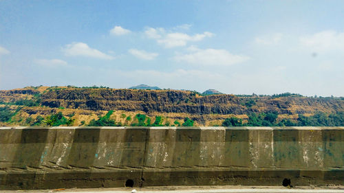 Scenic view of dam against sky