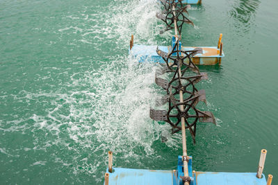 High angle view of water splashing in sea