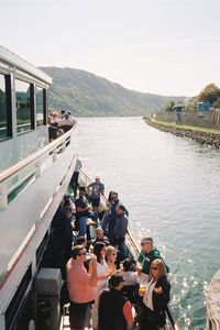 High angle view of people on river against sky