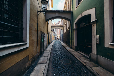 Narrow alley along buildings