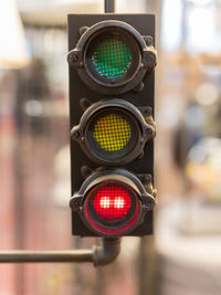 Vintage traffic lights with red light- street signal.
