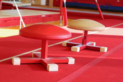 Empty chairs and tables in restaurant