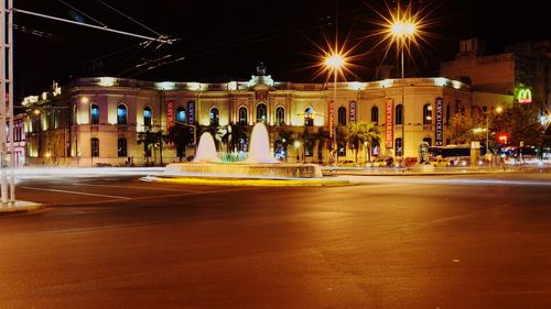 Light trails on city street at night