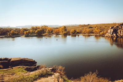 Scenic view of lake against clear sky