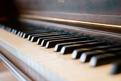 Close-up of piano at home