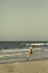 View of a running on beach