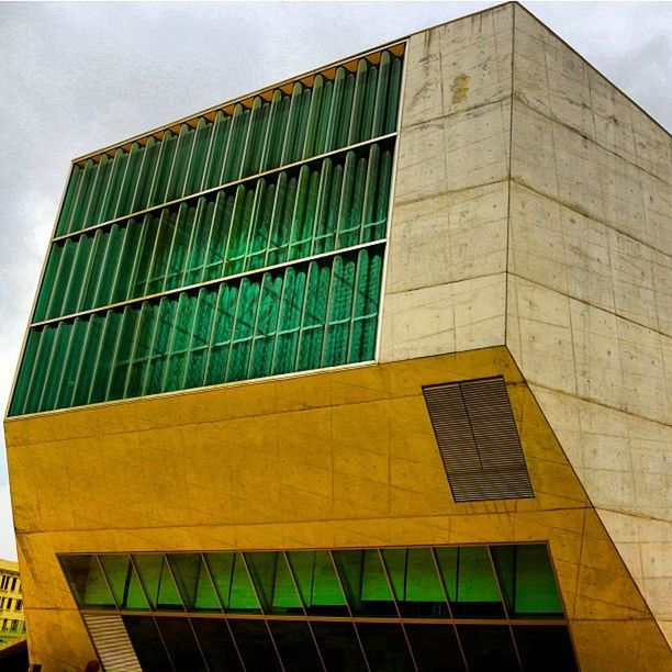 architecture, building exterior, built structure, low angle view, glass - material, modern, window, office building, reflection, building, city, tall - high, sky, tower, skyscraper, day, no people, pattern, geometric shape, outdoors