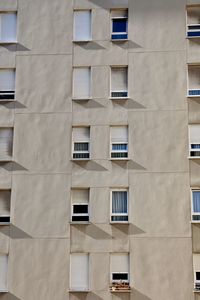 Windows on the facade of the building, architecture in bilbao city, spain