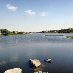 Scenic view of river against sky