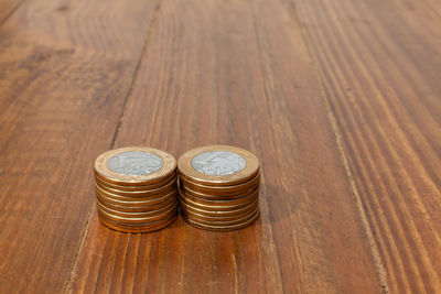 High angle view of coins on table