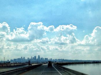 Road against cloudy sky