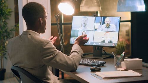 Midsection of businessman working at office