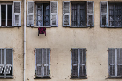 Low angle view of clothes drying on building