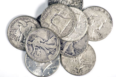 Close-up of coins on white background
