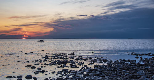 Scenic view of sea against sky during sunset